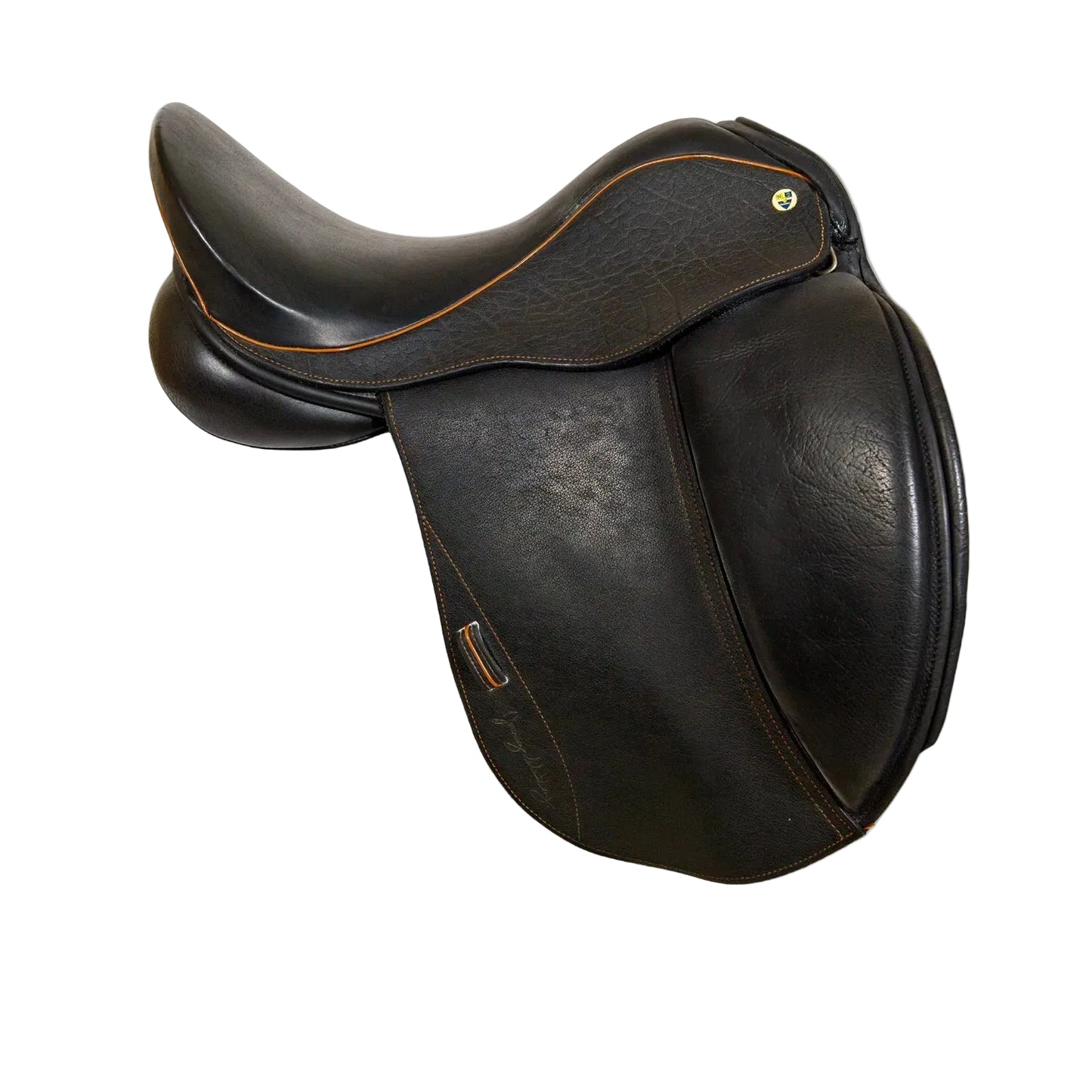 Brown leather saddle on a white background