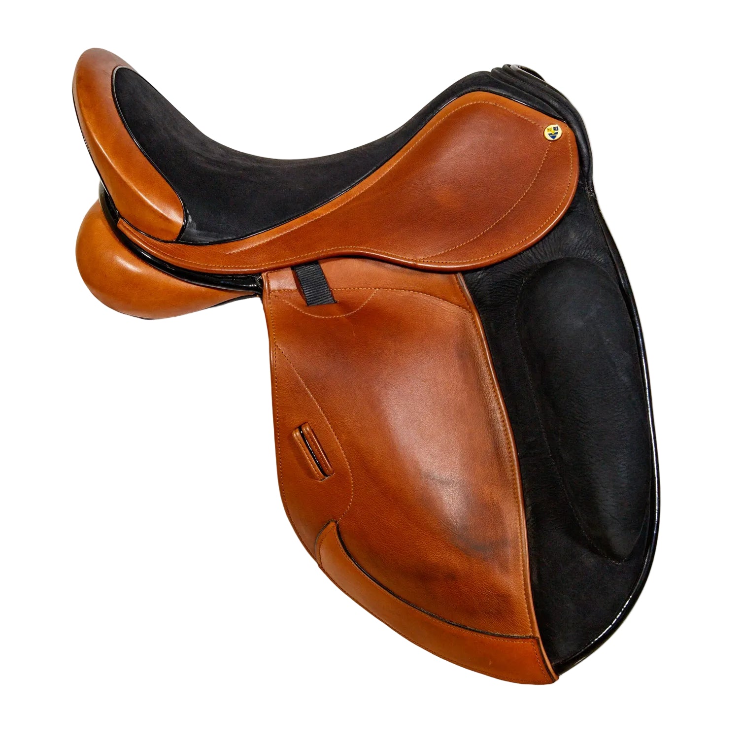Brown leather saddle on a white background